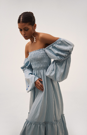 Жіноча сукня блакитного кольору з вишитими елементами byMe